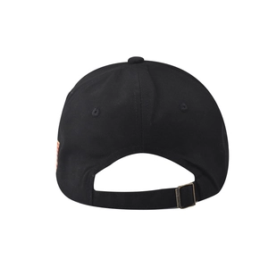 Detail view of cotton baseball cap featuring an adjustable strap and metal buckle on the back