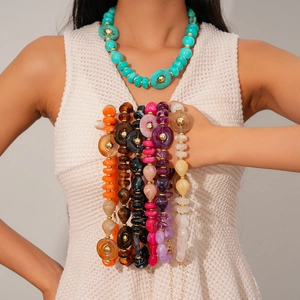 Chunky acrylic bead necklace with irregular round beads and golden spacers for women