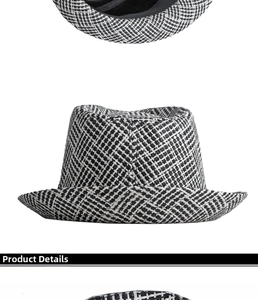Close-up detail of the woven pattern and texture on this black and white fedora sun hat