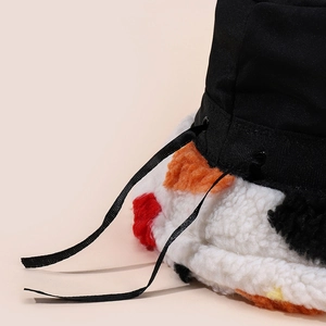 Lambswool bucket hat with colorful patchwork brim and stylish side drawstring detail