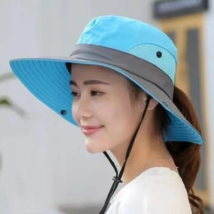 Women's blue and grey wide brim sun hat with adjustable chin strap for hiking