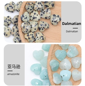 Macro detail of faceted heart charms in dalmatian stone and amazonite for DIY jewelry