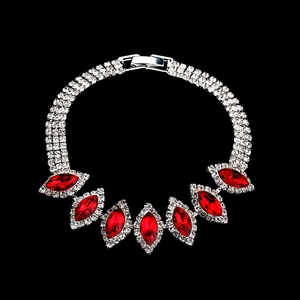 Elegant silver bridal necklace with rows of crystals and large red marquise gemstones