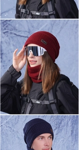 Close-up of winter knitted beanie and neck warmer set with diamond pattern and leather patch