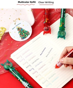 Close-up of Christmas 10-color shuttle pen with silicone deer antlers and festive patterns
