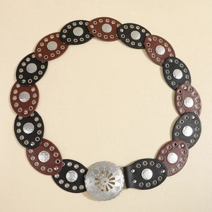 Women's western boho belt with black and brown oval faux leather and silver metal buckle