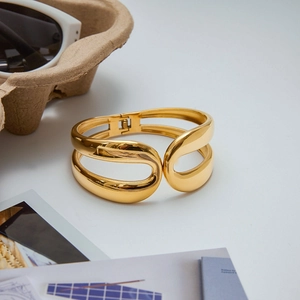 Polished gold stainless steel open bangle bracelet with a minimalist double-row design
