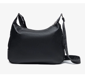 Close-up of black litchi pattern leather shoulder bag with white contrast stitching detail