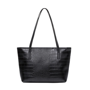 Detailed view of black crocodile pattern faux leather texture on large tote bag