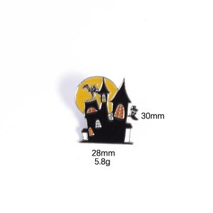 Enamel Halloween brooch with castle and witch silhouette showing 30mm x 28mm dimensions