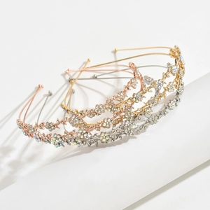 Detail of floral metal headband with sparkling rhinestones and crystal inlay designs