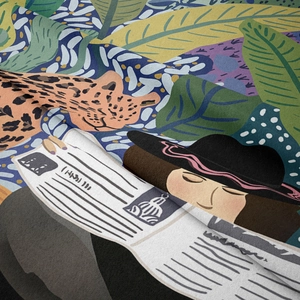 Detail showing soft fabric texture and artistic jungle print with a lady reading a newspaper