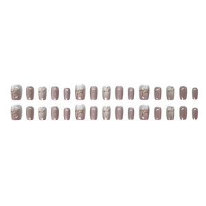Faux ongles œil de chat style bambou avec dégradé rose et motifs de feuilles d'or
