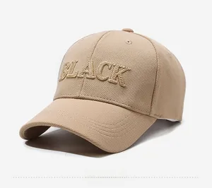 Detailed view of khaki baseball cap featuring premium 3D 'BLACK' letter embroidery