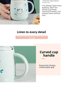 Close-up of green ceramic cat mug showing the handle detail and polished glossy finish