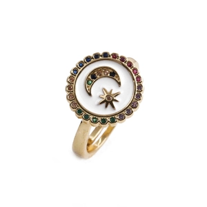 Detail of adjustable gold ring featuring enamel moon, stars, and colorful stones