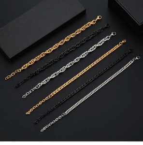 Detailed view of punk style stainless steel Cuban and braided chains in gold, silver, and black