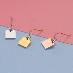 Three pairs of geometric square drop earrings in silver, gold and rose gold finishes