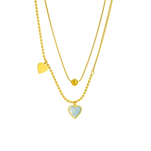 French vintage double-layered gold heart pendant necklace with beads on white background
