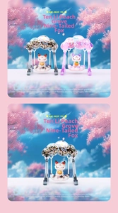 Detail of creative Nine-Tailed Fox resin figurines on cloud swings with peach blossoms