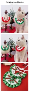 Détail d'un bavoir de Noël pour chat avec dentelle et motifs festifs au crochet