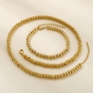 Parure collier et bracelet en perles d'acier inoxydable plaqué or 18 carats pour femme