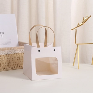 White square paper gift bag with transparent window and brown rope handle for flowers