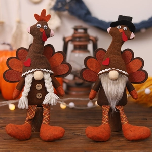 Detail of Thanksgiving long-leg turkey dolls with felt texture and wooden base