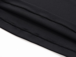 Detail shot of black slim fit T-shirt showing double-needle hem stitching and texture