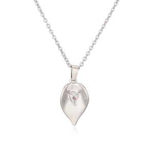 Elegant silver leaf pendant necklace with shimmering zircon stone on white background