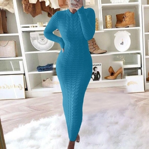 Detailed close-up of vibrant blue cable knit texture on a slim-fit knitted maxi dress