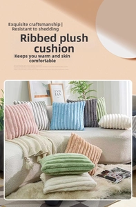 Close-up of soft ribbed faux fur pillows in various Morandi colors on a cozy sofa