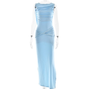 Detail view of light blue maxi dress featuring pleated bodice and crossover waist design