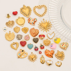 DIY jewelry making pendants in heart, sun and insect shapes with 18k gold plating