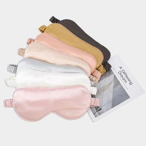 Premium 22 momme mulberry silk sleep masks in multiple colors arranged on a white background