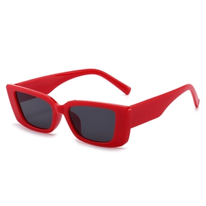 Retro small square frame sunglasses with red plastic frame and dark gray lenses for UV protection
