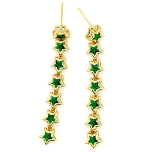 Close-up of long gold fringe earrings featuring seven dangling green star-shaped gemstones