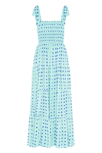 Detail of smocking chest and tie straps on mint green checkered tiered maxi dress