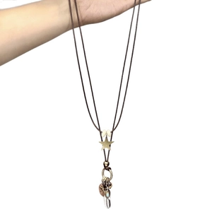 Bohemian tassel pendant long necklace with bronze star and feather charms for women