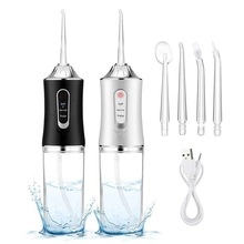 Set idropulsore orale senza fili con effetto spruzzi d'acqua e quattro ugelli inclusi