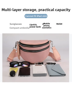 Detail shot of pink crescent crossbody bag showing large capacity with daily essentials