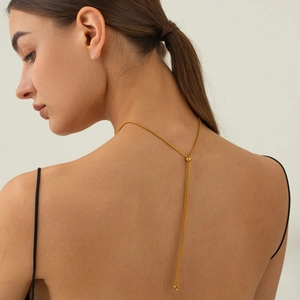 Detail of 18k gold plated stainless steel wave necklace with adjustable slider clasp