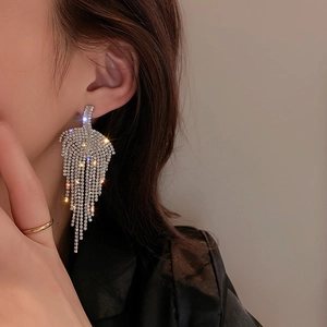 Silver fringe tassel earrings with rhinestones in a long dangling fashion style