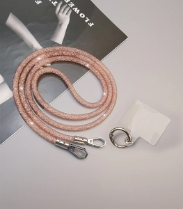 Pink rhinestone beaded phone strap with metal ring and transparent connector piece