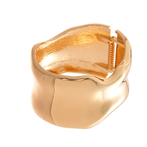 Polished gold irregular wavy wide cuff bracelet with metallic glossy finish