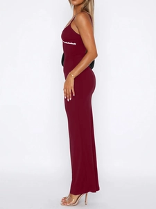 Side view of sleek deep red Y2K bodycon maxi dress with white lace neckline trim