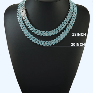 Detail view of silver Cuban link necklaces with blue stones in 18 and 20 inch lengths