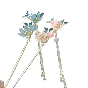 Traditional Chinese floral hairpins with enamel flowers and elegant metal tassels