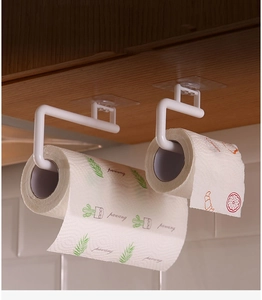 Kitchen paper roll holder set with two white plastic hooks under a wooden cabinet