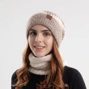 Winter knitted beanie and neck warmer set in beige and taupe striped plush fabric